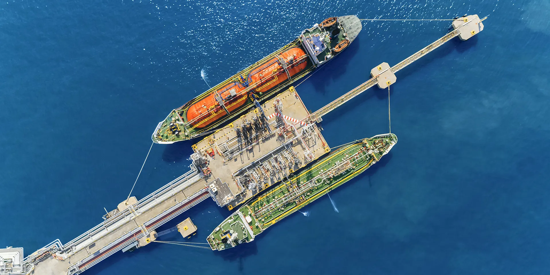 aerial top view oil tankers park at oil port