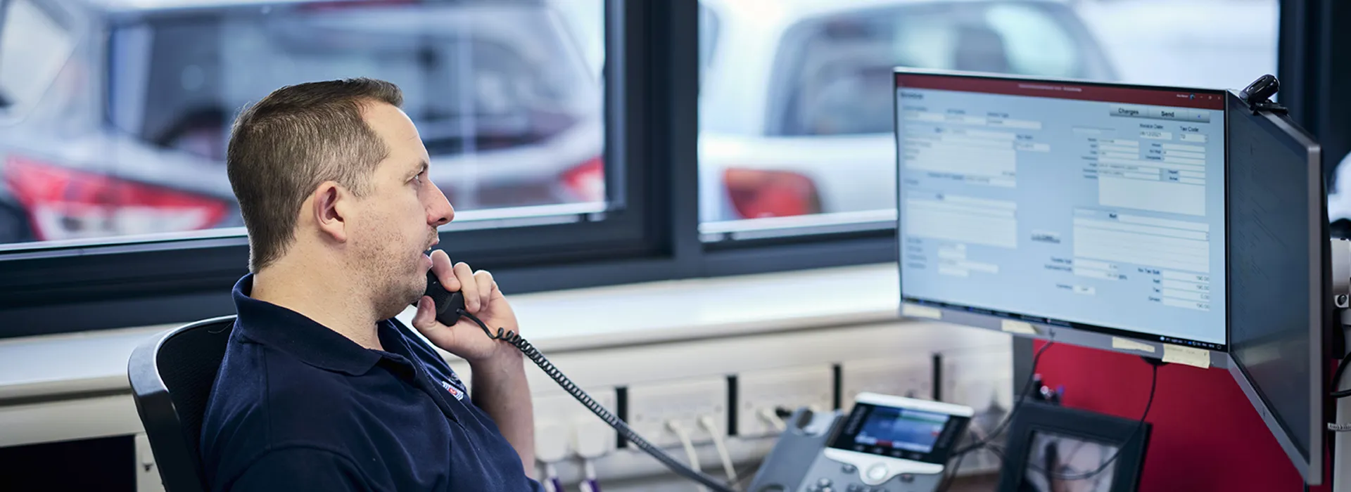 Freight operator at work on the phone