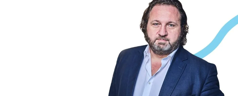 man in suit, blue and white background
