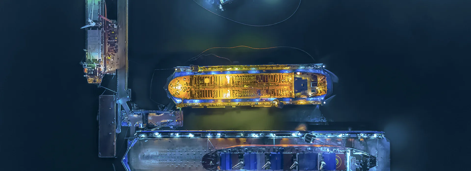 aerial view shipyard have crane machine and container ship in green sea