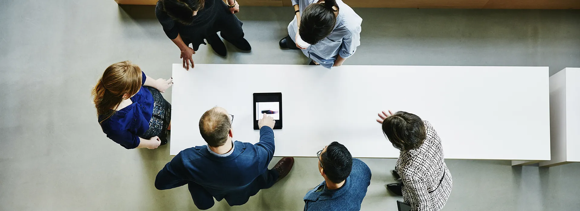 Business colleagues discussing project in office